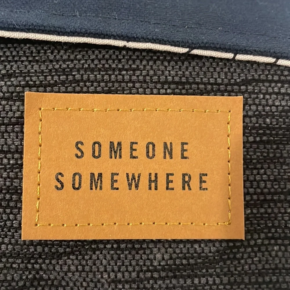 Delta One Someone Somewhere Artisan-Made Amenity Kit. Navy and Charcoal. NEW